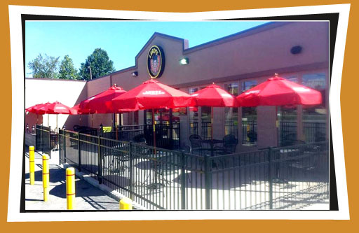 PATIO W RED UMBRELLAS
